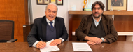autoridades de UNIT y UNASEV en firma de convenio